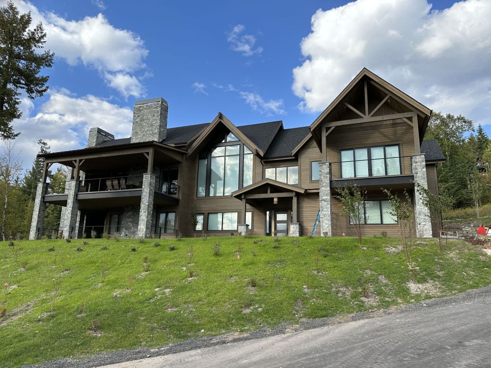 Guy and Tammy are building a beautiful house near the ski slopes