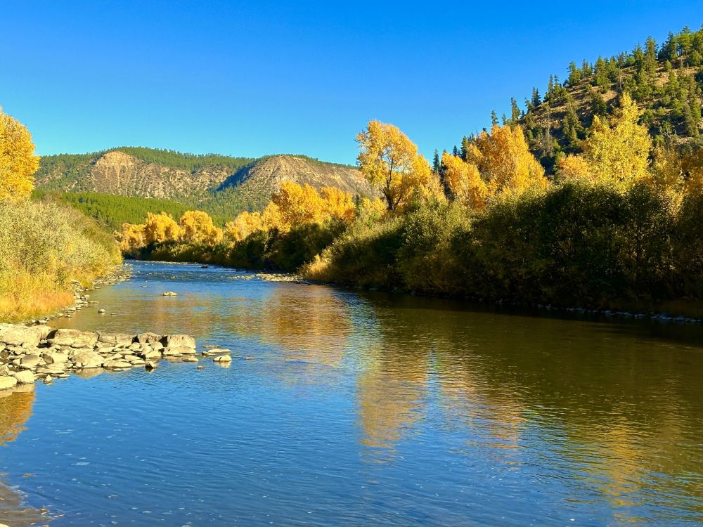 The sky was blue, the creeks and rivers crystal clear, and the trees wearing their fall colors