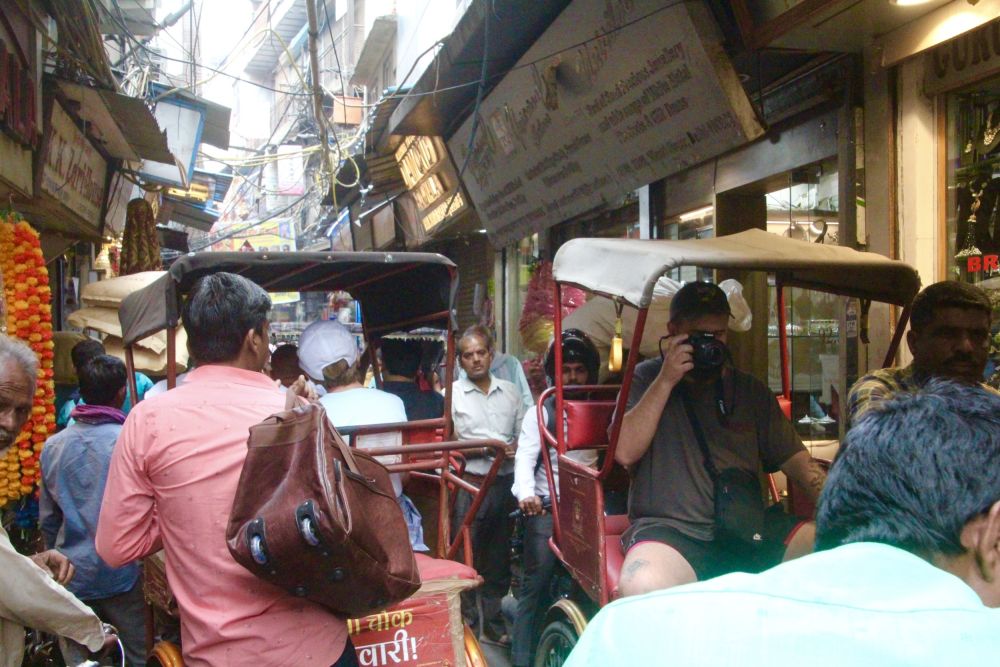  hundreds of shops and shoppers crowded into a street only 8 feet wide.