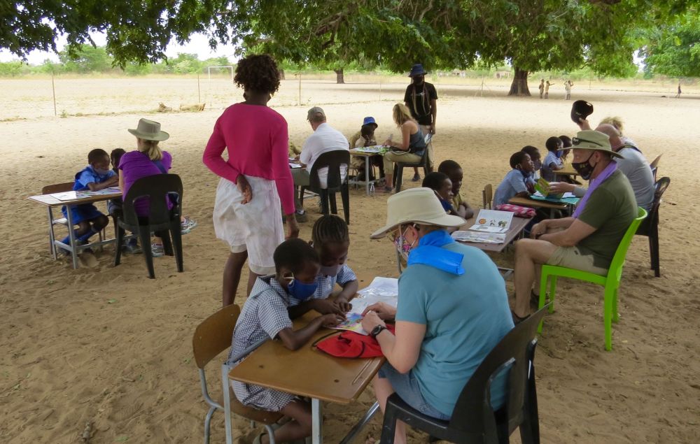 I'm always pleased to see how our friends jump into the role of teacher for these adorable kids