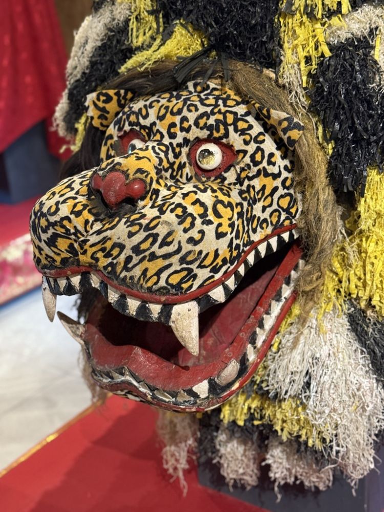 Bali is famous for its masks, decorations, and funeral parades .