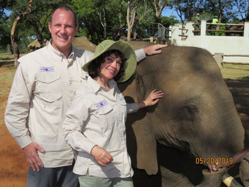 Our friends ,Chris and Kim, Getting up close and personal with one of the elephants on our elephant back safari