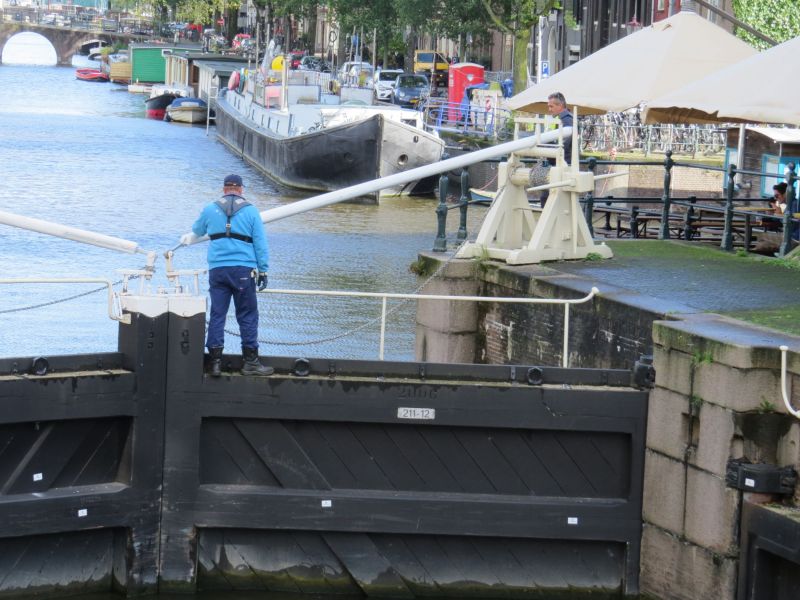 Since Amsterdam is below sea level they regulate the canals with huge locks