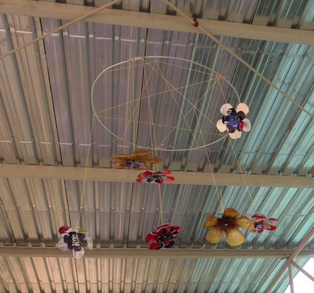 These amazing mobiles are and example of a simple craft or art these children would have never been exposed to