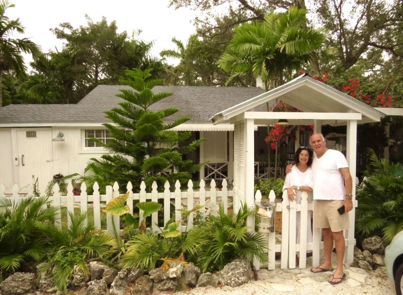 This is Phil and Suzy in front of their lovely cottage