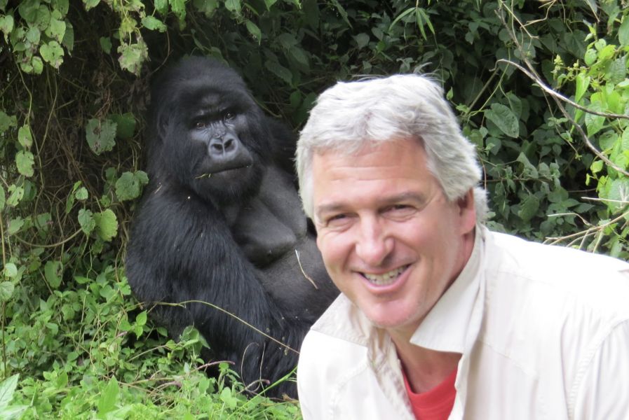 You had to wonder what this Silverback was thinking as Clark posed in front of them