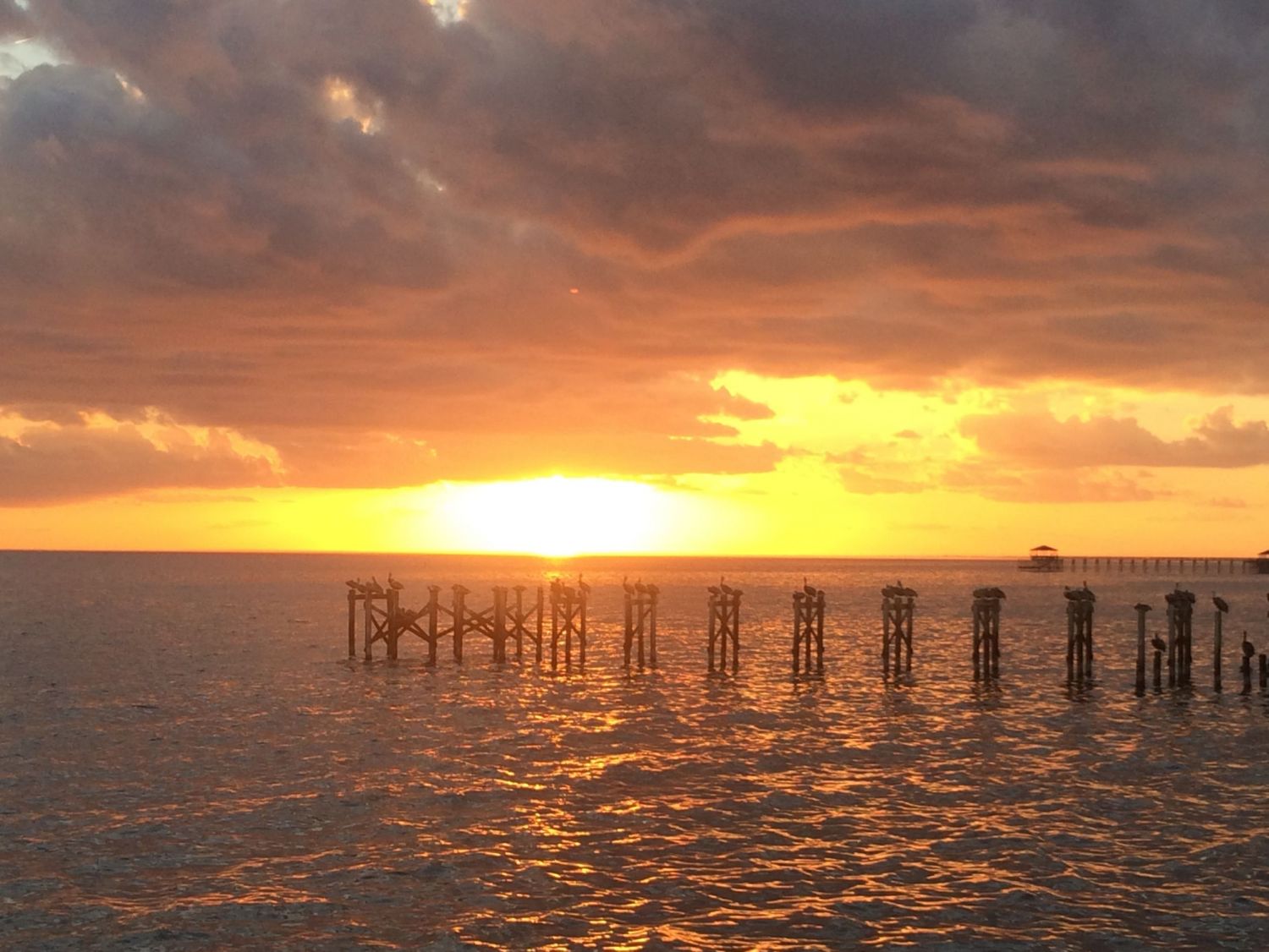 Winter sunsets from our friends dock-Both Jim and I are addicted to sunsets!